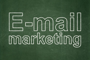 Advertising concept: E-mail Marketing on chalkboard background