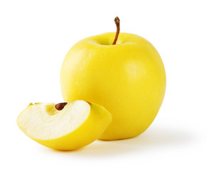 Yellow apple with a slice