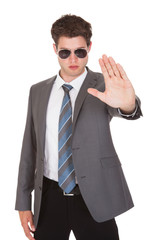 Young Businessman Showing His Hand