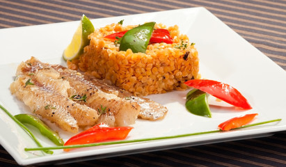 Grilled codfish with red lentil