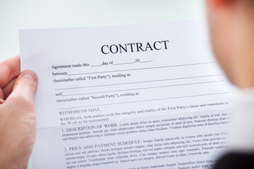 Person Holding Contract