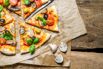 Close-up on a freshly split a pizza