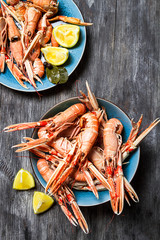 Fresh scampi served with lemon