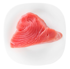 Tuna fillet on plate, isolated on white