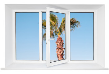 White plastic triple window with palm tree on blue sky. Isolated