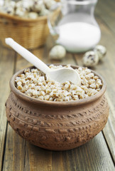 Buckwheat porridge, milk and quail eggs