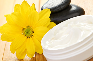 cosmetic cream with herbal flower