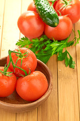 tomatoes in wooden bowlin