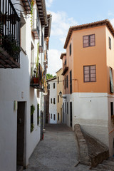 ancient narrow street in Granada, Spain