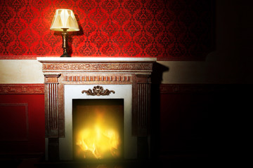Rich interior with antique lamp and fireplace in red vintage roo