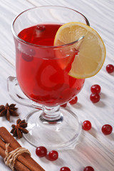 Spiced cranberry drink with lemon and cinnamon