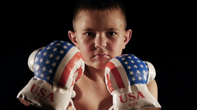 pissed off american boxer boy making threatening angry faces and