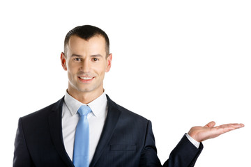 Businessman with palm up, isolated on white