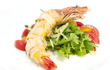 jumbo shrimp with herbs and several types of tomatoes