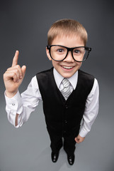 Wide angle portrait of little businessmen in glasses