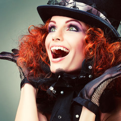  Fashion girl portrait.Accessorys.On grey  background. Red hair.