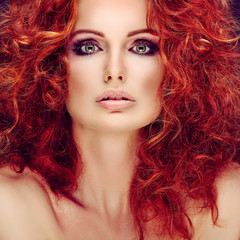  Fashion girl portrait.Accessorys.On grey  background. Red hair.