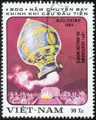 Naklejka premium stamp devoted to 200 anniversary of flight in a balloon