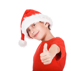 Beautiful happy little Santa shows thumbs up smiling