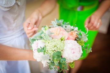 bride holding a wedding bouquet