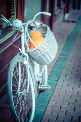 Blue bicycle in local Amsterdam street. © Curioso.Photography