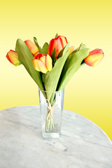 Yellow tulips on the table.