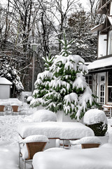 Cafe chairs in Park. Bistro Set Melting. Garden furniture meltin