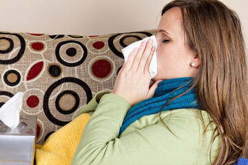 Young woman at home having flu