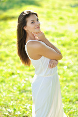Fototapeta na wymiar Young beautiful model girl posing outdoors