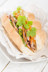 Banh Mi - Crusty bread filled with smoked duck breast slices