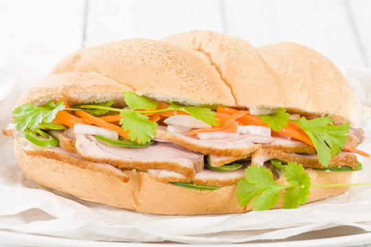 Banh Mi - Crusty bread filled with smoked duck breast slices