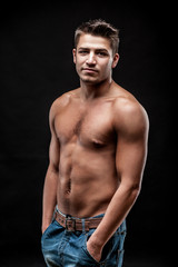 young man on dark background