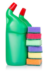 Plastic bottles of cleaning products and kitchen sponges