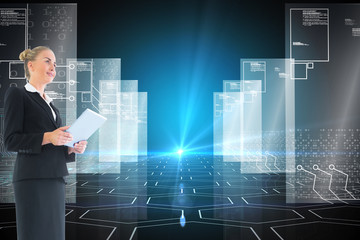 Composite image of businesswoman holding new tablet