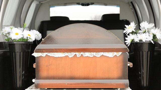 The coffin in a hearse  