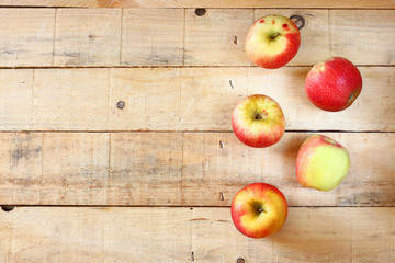 Naklejka na ściany i meble apples on wooden background