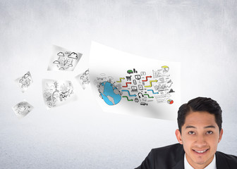 Composite image of smiling asian businessman pointing