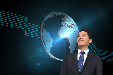 Composite image of smiling asian businessman