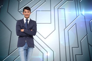 Fototapeta premium Composite image of smiling casual businessman with arms crossed