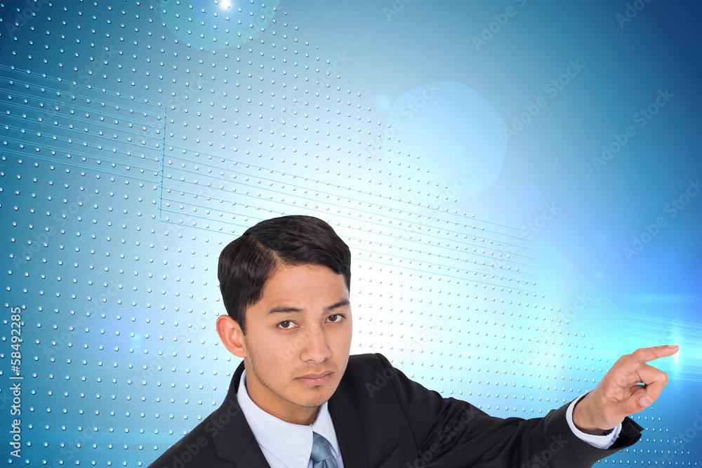 Poster composite image of unsmiling asian businessman pointing