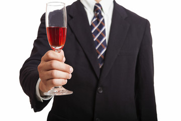 Businessman holding wine