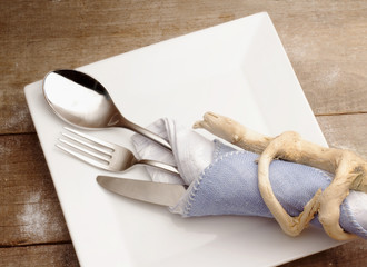 silverware over ceramic plate