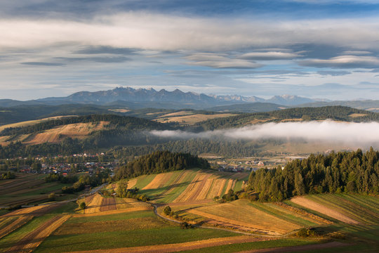 Fototapeta Hills in southern Poland, with Tatra Mountains on horizon