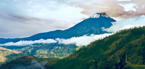 Hermosa Valley with Eruption of a volcano Tungurahua and town Ba