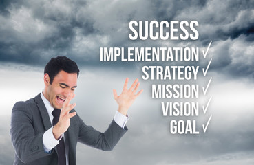 Composite image of excited businessman catching