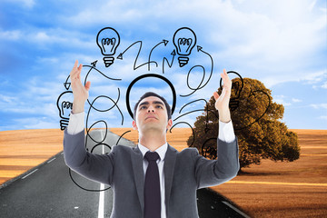 Composite image of unsmiling businessman with arms raised