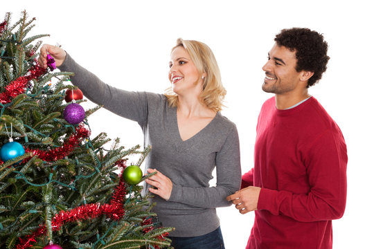 Christmas Couple Decorating Tree