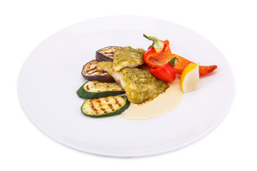 Fish Steak with Grilled Vegetables, White Sauce and Lemon