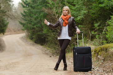 Pretty girl hitchhiking