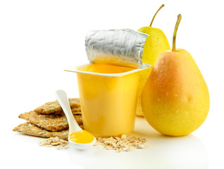 Tasty yogurt in open plastic cup, cookies and fruit, isolated